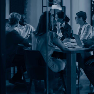 Image of a business team meeting in a room